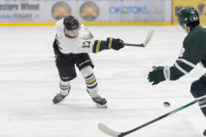 Kade Duell taking a shot on the Crusaders' net in a previous game. (Chad Goddard/Okotoks Oilers)