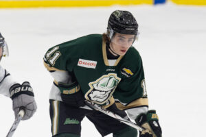 Teo Pisani lining up on the wing during a face-off. (Chad Goddard/Okotoks Oilers)