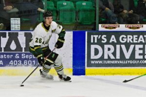 Markus Jakobsen looking for an open man. (Scott Savard/Okotoks Oilers)