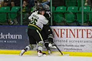 Markus Jakobsen plastering a Bulldog to the boards. (Scott Savard/Okotoks Oilers)
