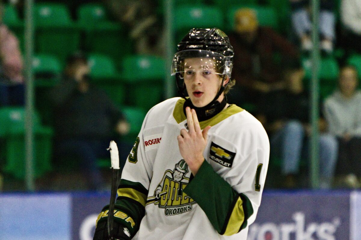 Michael Mikan cooling down his hot hands after finding the back of the net. (Scott Savard/Okotoks Oilers)
