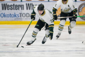 Brady Engelkes turning on the jets while holding control of the puck. (Chad Goddard/Okotoks Oilers)