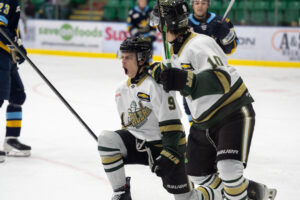 Josh Wiebe pumped up after potting a goal against the Spruce Grove Saints. (Chad Goddard/Okotoks Oilers)