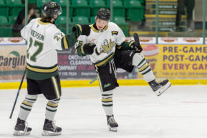 Nate Porter celebrates after getting the Oilers on the scoreboard. (Chad Goddard/Okotoks Oilers)