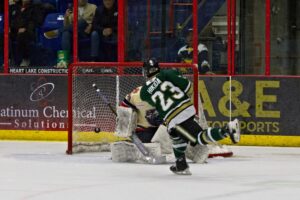 Jamie Hikida finding the back of the net on his penalty shot. (Scott Savard/Okotoks Oilers)